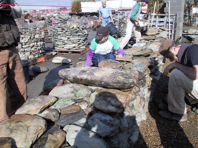 Using the rounded 'cow-patty' stones to make a beautiful wall Using the rounded 'cow-patty' stones to make a beautiful wall